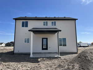 Back of property featuring a patio