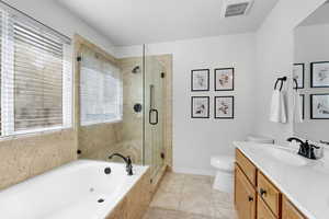 Oversized soaking tub and shower, dual sinks