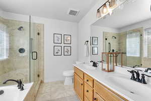 Oversized soaking tub and shower, dual sinks