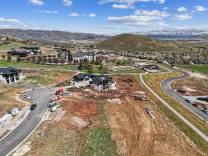 Drone / aerial view featuring a residential view and a mountain view