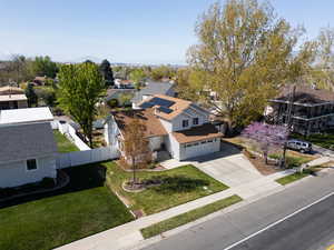 Birds eye view of property with a residential view