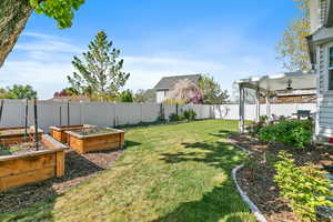 Planter boxes and mature trees and landscaping