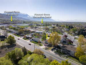 Birds eye view of property featuring a residential view and a mountain view