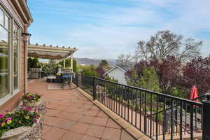 Balcony featuring a mountain view