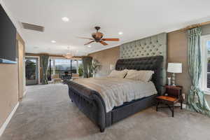 Primary Bedroom, carpeted with baseboards, visible vents, recessed lighting, and crown molding. Silk wallpaper.