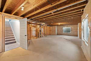 Unfinished below grade area with stairway
