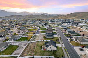 Drone / aerial view with a residential view and a mountain view