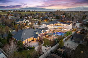 Aerial perspective of suburban area with a mountainous background