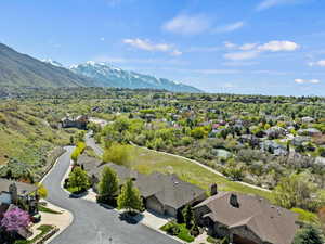 Drone / aerial view with a mountain view and a residential view