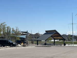 Surrounding community featuring a gazebo and a mountain view