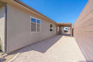Exterior space featuring stucco siding