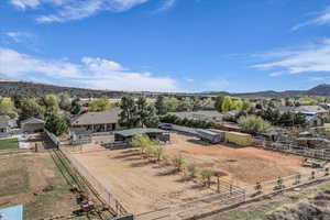 Drone / aerial view with a mountain view, a residential view, and a rural view