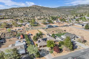 Drone / aerial view featuring a residential view and a mountain view