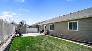 View of yard featuring a patio area and a fenced backyard