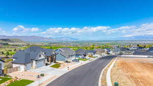Birds eye view of property featuring a residential view and a mountain view