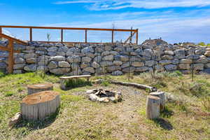 View of yard featuring a fire pit