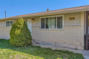 Exterior space with brick siding