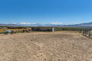 Property view of mountains featuring a rural view
