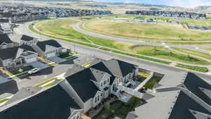 Drone / aerial view featuring a residential view and a mountain view