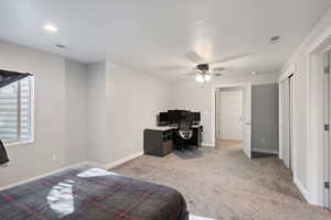 Carpeted bedroom featuring recessed lighting, visible vents, a ceiling fan, and baseboards