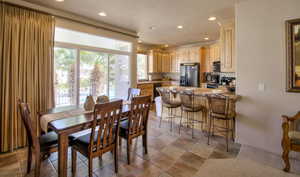 Dining room featuring recessed lighting, visible vents, tile patterned flooring, and baseboards