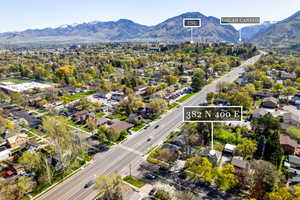 Drone / aerial view featuring a mountain view and a residential view