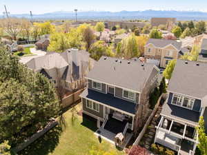 View of backyard with covered deck and full landscaping