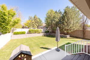 View of yard featuring a fenced backyard and a patio area