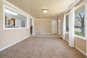 Unfurnished sunroom with visible vents