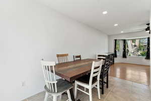 Dining space featuring baseboards, recessed lighting, ceiling fan, and light tile patterned flooring