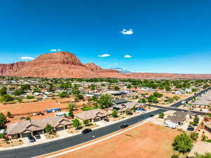 Drone / aerial view featuring a mountain view and a residential view