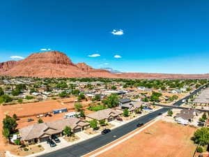 Birds eye view of property featuring a mountain view and a residential view