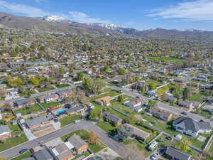 Drone / aerial view with a residential view and a mountain view