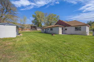 View of yard with fence