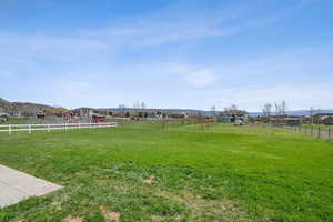 View of yard with fence
