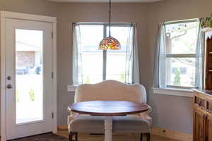 Dining room featuring a wealth of natural light