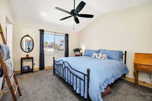 Bedroom featuring carpet flooring, baseboards, recessed lighting, lofted ceiling, and ceiling fan
