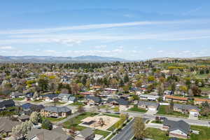 Aerial view featuring a residential view and a mountain view