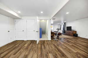 Workout room featuring visible vents, wood finished floors, and recessed lighting
