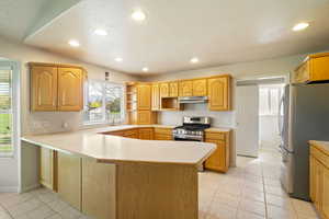 Spacious kitchen featuring stainless steel appliances