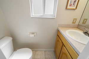 Half bath off garage entrance.