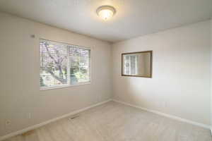 South facing bedroom 2 of 3 on main level