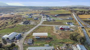 Birds eye view of property featuring a rural view and a mountain view