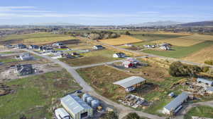 Drone / aerial view featuring a mountain view and a rural view