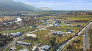 Birds eye view of property with a mountain view