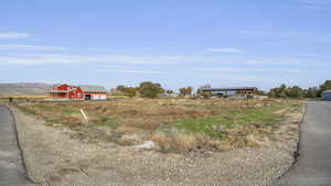 View of street with a rural view and a barn