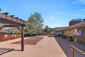View of patio / terrace featuring a pergola and fence