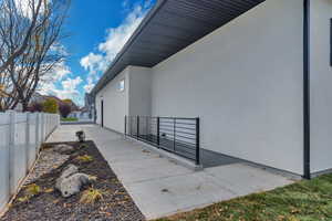 View of side of property with stucco siding