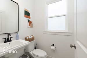 Bathroom with a sink and toilet