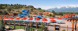 View of pool with a mountain view
